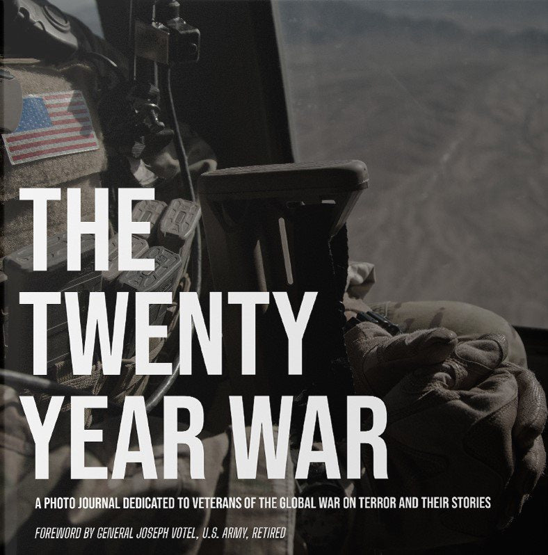 Jacket cover of The Twenty Year War: service member with flag and rifle looking out window over bleak terrain
